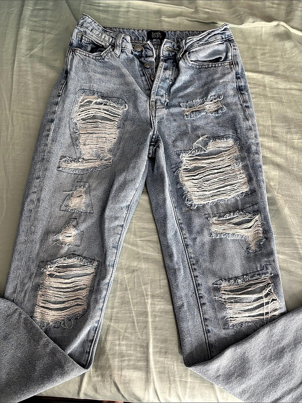 Simple Society Distressed Skinny Jeans in Blue